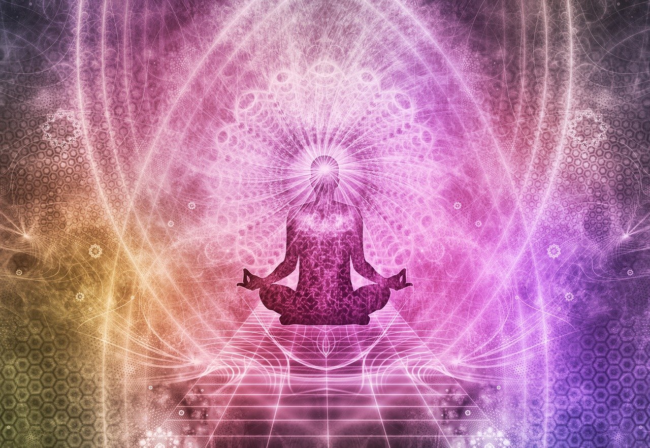 Silhouette of a person meditating against a cosmic background, representing deep practice.